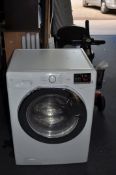 A HOOVER HLW585DC WASHER DRYER, width 60cm, depth 58cm, height 85cm (PAT pass, spin cycle run but