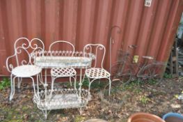 A COLLECTION OF MODERN METAL GARDEN ITEMS, including two ornamental bikes, three chairs and an