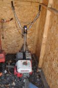 A HONDA F501 PETROL ROTAVATOR (engine pulls freely but hasn't been started)