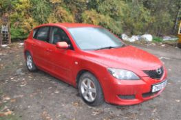 A 2006 MAZDA 3 TS FIVE DOOR HATCHBACK CAR in red with a 1598cc petrol engine, 5 speed manual