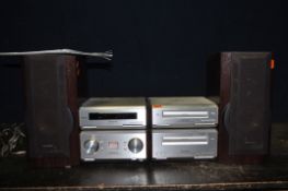 A TECHNICS HD560 MINI HI FI with amp, tuner, CD player, a tape player (doesn't appear play) and a