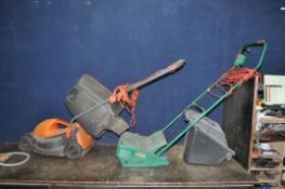 A FLYMO ROLLERMO ELECTRIC LAWN MOWER with grassbox (PAT fail due to taped cable but working) and a