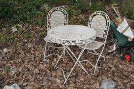 A MODERN METAL FOLDING TABLE AND A PAIR OF MATCHING CHAIRS with lattice fretwork, 70cm diameter