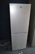 A BEKO CFG1552S FRIDGE FREEZER width 55cm, depth 57cm, height 152cm (PAT pass and working at 0