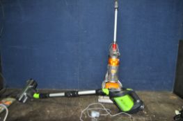 A DYSON DC24 UPRIGHT VACUUM CLEANER (PAT pass and working) and a G Tech Pro 2 cordless vacuum with