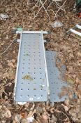 A FOUR IN ONE ALUMINIUM PLATFORM LADDER with two steel treads closed height 123cm