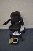 A RASCAL RIO ELECTRIC POWERCHAIR, with charger (PAT pass and working but battery integrity unknown)