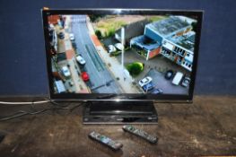 A PANASONIC TX-L37E5B 37in TV with remote and a Panasonic Blu-Ray player with remote (both PAT