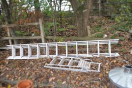 A YOUNGMAN 100 DOMESTIC TRIPLE EXTENSION ALUMINIUM LADDER 337cm closed height and a step ladder (2)