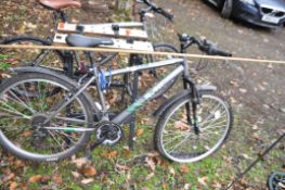 AN APOLLO SLANT GENTS MOUNTAIN BIKE with 18speed Shimano gears and 17in frame