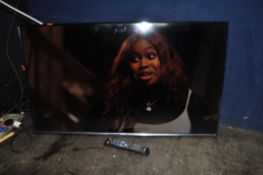 A SAMSUNG UE43J5500AK 43in SMART TV with remote (partial wall bracket but no stand) (PAT pass and