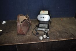 A COOKWORKS COFFEE MACHINE (PAT pass, powers up but not tested any further) and a bag containing