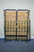 A LATE 19TH / EARLY 20TH CENTURY BRASS AND CAST IRON 4FT6 BEDSTEAD, later green painted and modern