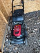 A HONDA HRH536 SELF PROPELLED PETROL LAWN MOWER with grassbox, Condition report: engine pulls freely