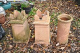 THREE VINTAGE CHIMNEY POTS, two with castellated tops 71cm high (3). Condition Report; no obvious