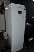 A GRUNDIG LARDER FREEZER width 60cm, depth 62cm, height 183cm (PAT pass and working at -18 degrees)