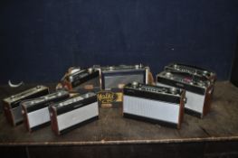A TRAY CONTAINING EIGHT MID 20th CENTURY ROBERTS RADIOS comprising of 3 R707 (one has broken strap),