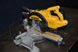 A DeWALT DWS773 SLIDING COMPOUND MITRE SAW with 216mm blade (PAT pass and working)