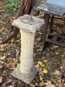 A CONCRETE SUNDIAL, in the form of an Egyptian column with a brass dial, height 80cm. Condition