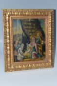 A FOLK PANEL 'THE NATIVITY' PAINTING depicting the birth of Jesus Christ, a partial Latin (?) text