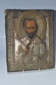 AN ORTHODOX 'SAINT NICHOLAS OF MYRA' ICON with oklad attached, depicting the saint with an