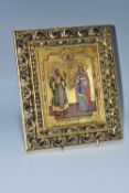 AN ORTHODOX GILT ICON oil on wood panel, depicting two holy figures to include St Catherine and St