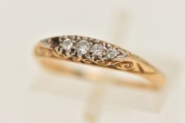 A DIAMOND SET RING, designed as a white and yellow metal boat ring, set with four transitional cut