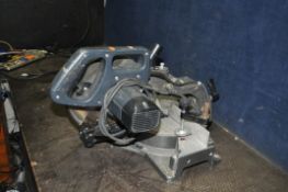 A PERFORMANCE POWER SLIDING COMPOUND MITRE SAW with a 254mm blade (PAT pass and working)