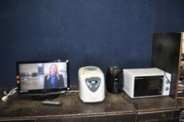 A TECHNIKA 21.6in TV/DVD COMBI with remote (PAT pass and working), a Russell Hobbs microwave, a