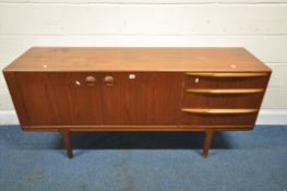 A MCINTOSH TEAK SIDEBOARD, designed by Tom Robertson, with three drawers, and double cupboard doors,