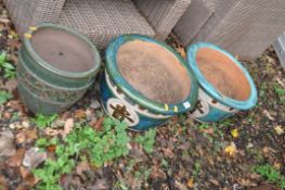 THREE GLAZED GARDEN PLANT POTS including a pair with Chinese characters to bowl, 42cm in diameter (