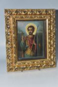 A GREEK ORTHODOX 'ST ISIDORE OF CHIOS' ICON depicting the martyred saint with a texture gilt halo,