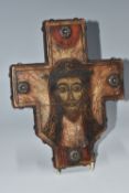 AN ORTHODOX 'CRUCIFORM' ICON depicting the face of Jesus Christ with his crown of thorns, four