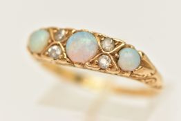 AN EARLY 20TH CENTURY 18CT GOLD OPAL AND DIAMOND RING, set with three circular cut white opal