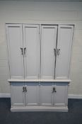 A LARGE PAINTED PINE HOUSE-KEEPERS CUPBOARD, fitted with four sets of double cupboard doors,
