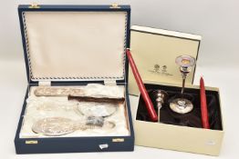 A SILVER CASED VANITY SET AND 'ARTHUR PRICE' CANDLE STICK HOLDERS, to include a hand held mirror,