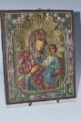 AN ORTHODOX 'HODEGETRIA' ICON with a fixed polychromatic oklad, a flared halo to the Virgin Mary and