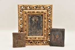 THREE NINETEENTH CENTURY OKLAD MOUNTED MINIATURE ORTHODOX ICONS, comprising a figure of a saint with