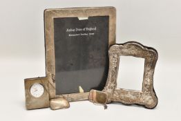 A SMALL ASSORTMENT OF SILVER, to include a polished rectangular silver photo frame, hallmarked '