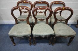 A SET OF SIX VICTORIAN STYLE BALLOON BACK CHAIRS, with green foliate upholstery, raised on fluted