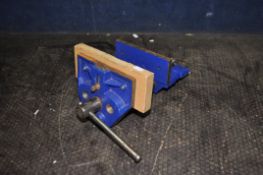 AN IRWIN RECORD CARPENTERS VICE with 7in vice and one wooden jaw protector