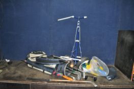 AN OLYMPUS GOLF BAG CONTAINING CLUBS including a hickory shafted putter, Wilson irons, Spalding