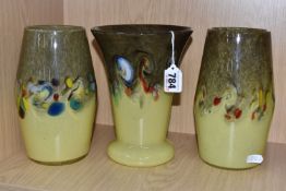 THREE STRATHEARN GLASS VASES, comprising a flared footed vase and two vases of swollen barrel