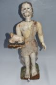 A LARGE POLYCHROME 'JOHN THE BAPTIST' WOODEN SCULPTURE depicting an image of John the Baptist in a
