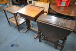A STAINED PITCH PINE SCHOOL DESK, along with an oak tea trolley and a gate leg table, condition