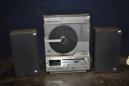 A MITSUBISHI MC8000 MUSIC CENTRE with a linear tracking turntable, FM radio, tape and matching