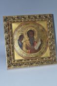 AN ORTHODOX FRAMED CIRCULAR ICON OF THE APOSTLE MATTHEW, late nineteenth/early twentieth century,