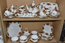 A FORTY SIX PIECE ROYAL ALBERT OLD COUNTRY ROSES DINNER SERVICE, comprising a teapot (marked
