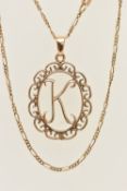 A 9CT GOLD 'K' INITIAL PENDANT WITH CHAIN, openwork oval pendant displaying the initial 'K',