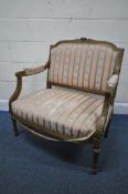 A LOUIS XVI STYLE CARVED GILTWOOD OPEN ARMCHAIR, with stripped upholstery, width 85cm x depth 64cm x